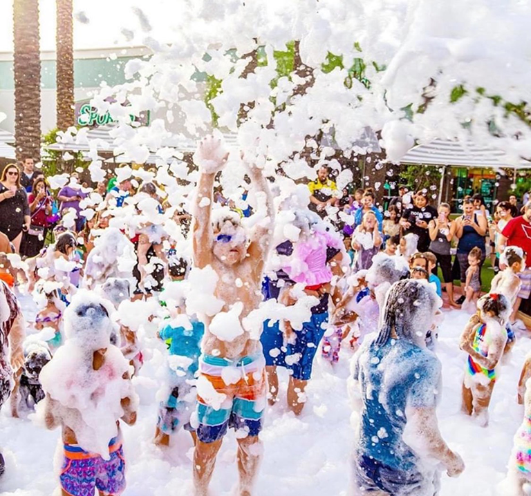 Kids having an amazing time at a Top Tier foam party in Sacramento